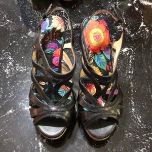 Black straps wedges.